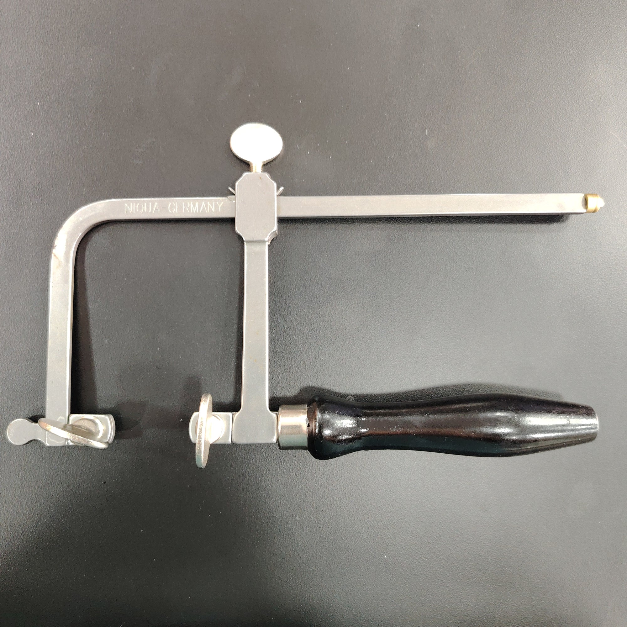 Arco de sierra ajustable