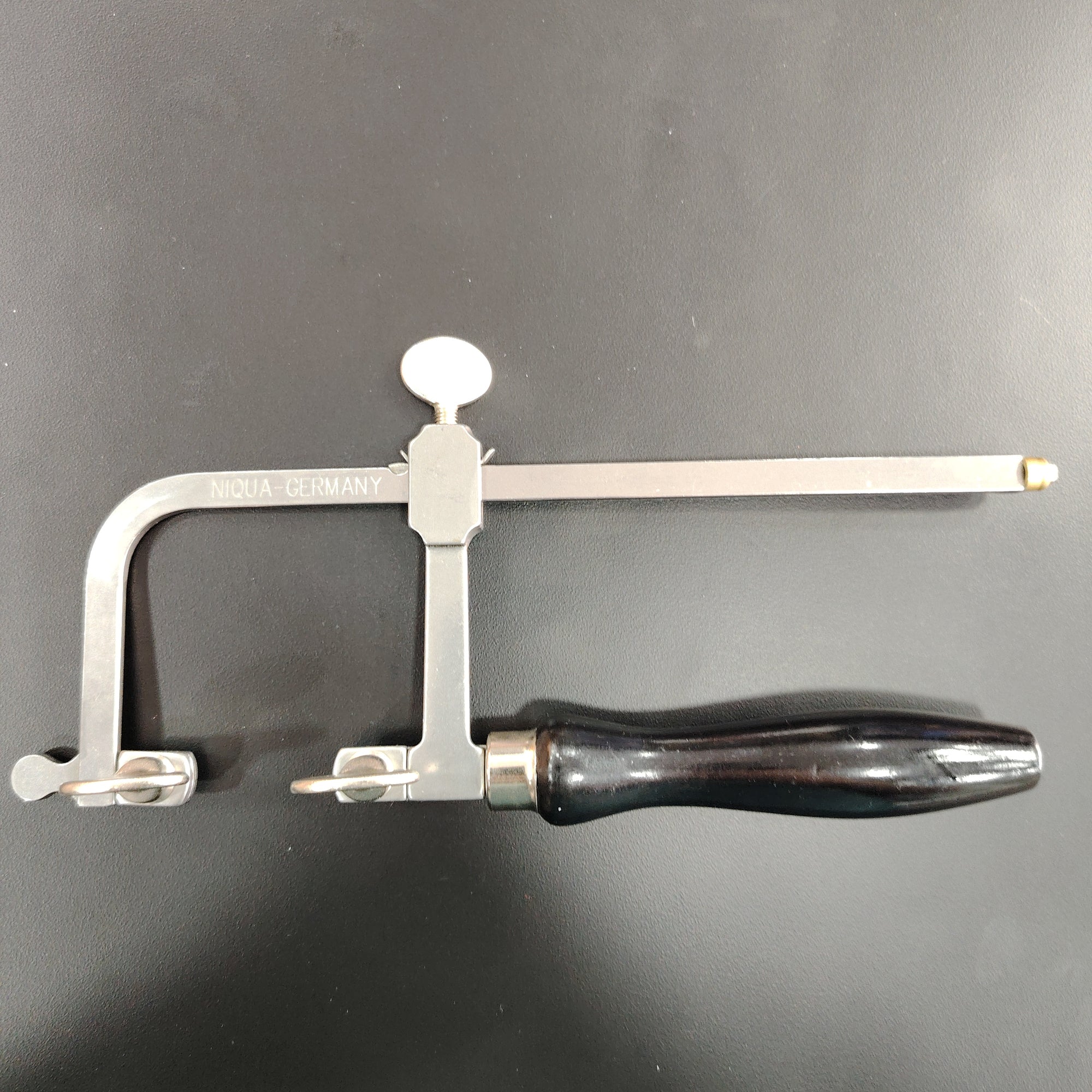 Arco de sierra ajustable